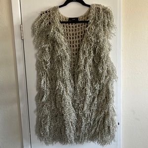 Feathery looking vest. Size L. Very unique!